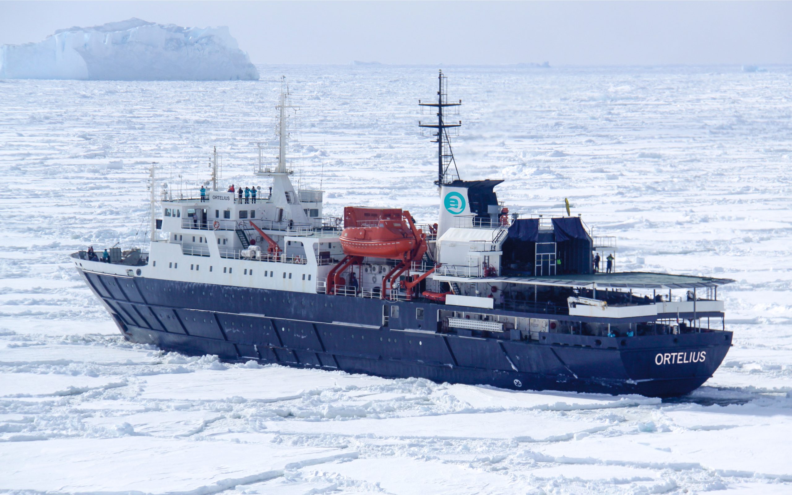 Overhead view of the ship Ortelius sailing through the pack ice in Antarctica.